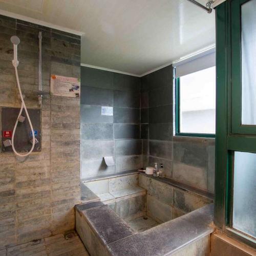 礁溪【多愛溫泉會館】經典平面雙人房住宿券(MO)1