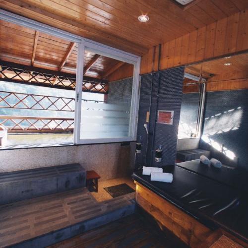 苗栗【日出溫泉渡假飯店】雙人90分鐘湯屋券/不分平假日(MO)2